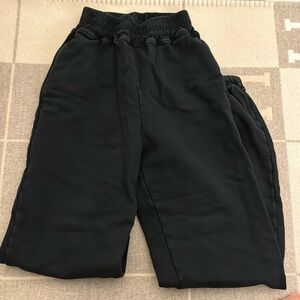 Simon miller sweats black with Simon miller embroidered on the back of leg